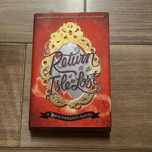 “Return to the Isle of the Lost” A Descendants Novel. By: Dela Cruz